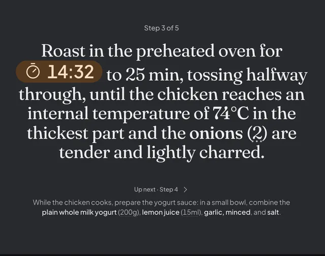 Daily Simmer cooking mode on step 3 of a sheet-pan shawarma chicken, with the roast timer running at 14:32 and the next step below.